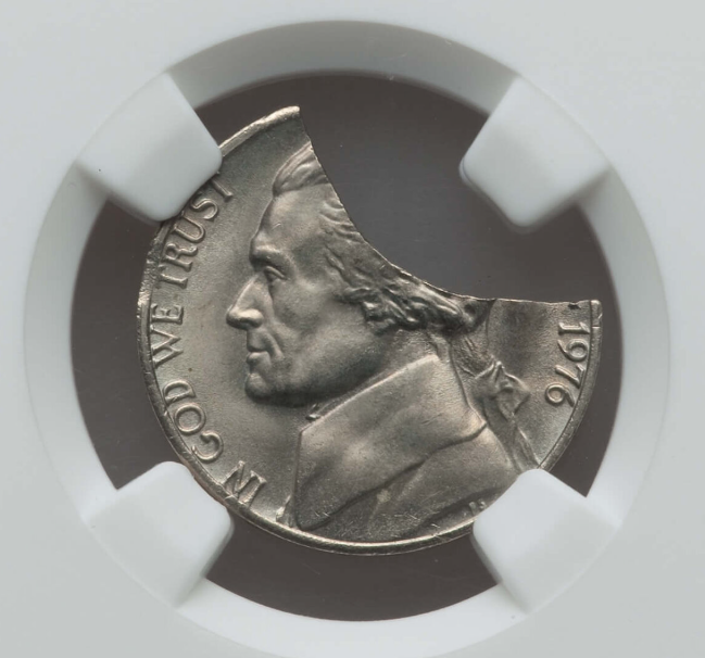 1976 Jefferson nickel curved clip planchet error showing a crescent-shaped missing section at the coin's edge caused by incomplete planchet punching